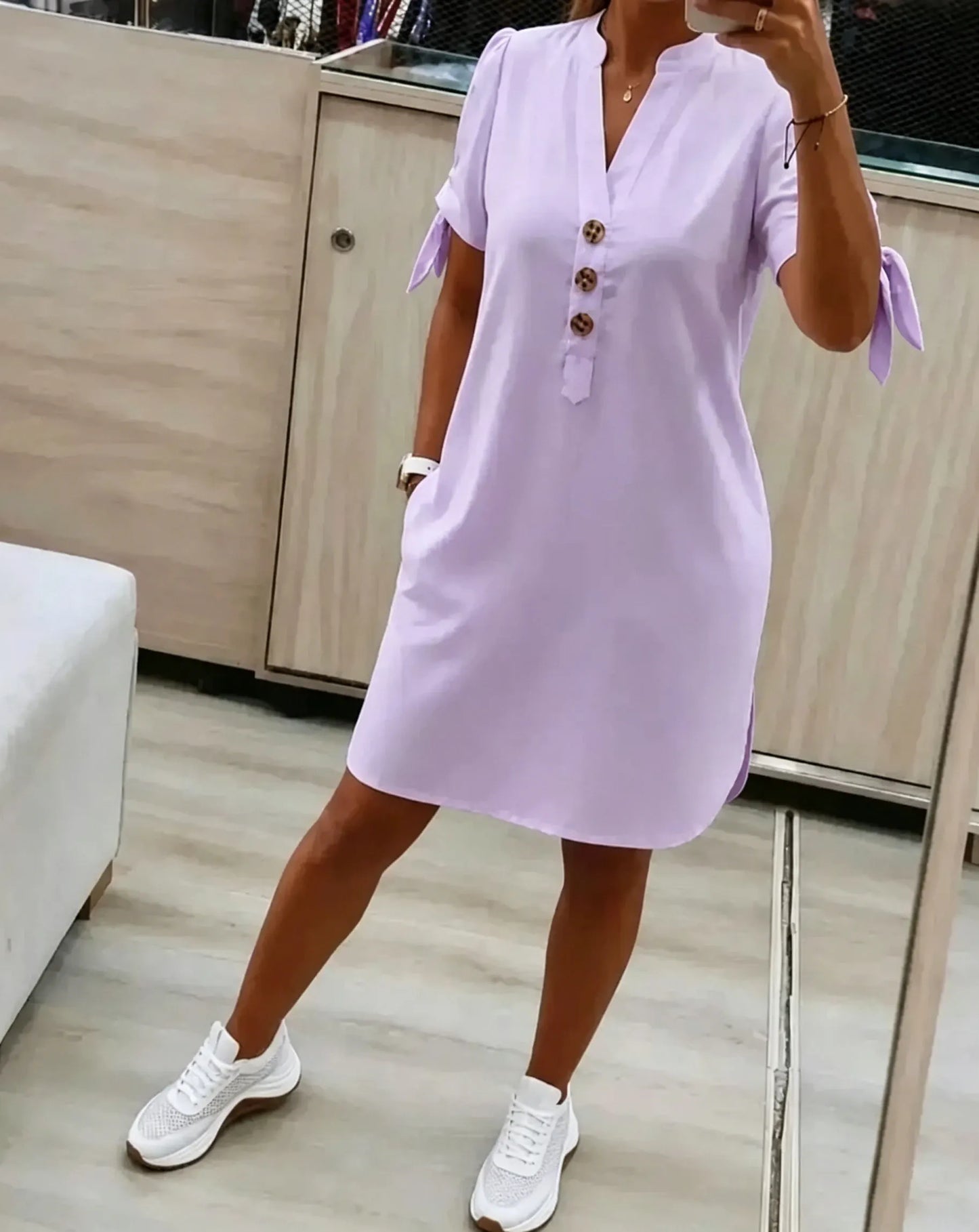 Loose-fitting, flattering, straight-cut midi shirt dress with side pockets